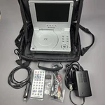 Polaroid PDV-0700 Portable 7" Dvd Player W/remote, 110 & 12 Power Adaps Bag. Fixed Price $28.87.