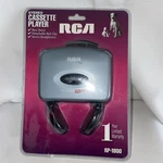Vtg Sealed Rca Cassette Player W/stereo Headphones Walkman RP1800. Fixed Price $28.90.