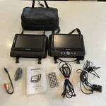 Sylvania SDVD9957-D 9" Dual-screen Player With Case & Remote. Fixed Price $48.01.