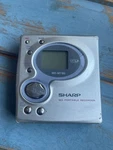 Vintage Sharp Minidisc Walkman MD-MT180. Fixed Price $70.00.
