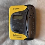 Vintage Sony WM-FS473 Sports Walkman Yellow Black Fm/am Cassette Headphones. Fixed Price $60.00.