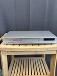 Aiwa XD-AX1U Dvd Player Cd-r/rw MP3 Dts Out S-video Component Composite Silver. Fixed Price $10.00.