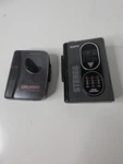 Sony Walkman WM-EX162 Personal Cassette And Sanyo GP25 For Part Only. Fixed Price $22.00.