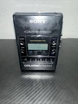 Vtg Sony Walkman Am Fm Radio Cassette Player Black WM-F2081. Fixed Price $45.00.