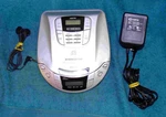 Curtis CD084 Portable Player With Am/fm Radio, Adapter And Accessories. Fixed Price $24.95.