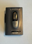 Sharp Walkman Radio/cassette JC-170(GY) For Parts Only. Fixed Price $18.99.