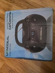 Monodeal Portable Cd Player. Fixed Price $50.00.