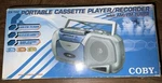 Coby Portable Cassette Player/recorder With Am/fm Tuner Model CX144. Fixed Price $29.95.