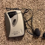 Gpx C3125 Am/fm Cassette Personal Stereo With Headphone Jack, Silver Gray. Fixed Price $10.00.