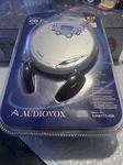 Audiovox Personal Cd Player W. Car Kit DM8717-45K New Cracks Bubble. Fixed Price $35.00.