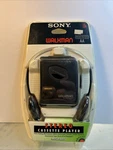 Sony Walkman Cassette Tape Portable Player WM-EX102 W/ Headphones New Nos. Fixed Price $185.00.
