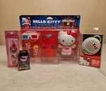 New Hello Kitty Bundle- Bluetooth Speaker, Universal Toy, Charm & Wooden Doll. Fixed Price $130.00.