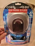 New In Box Coby CX-CD101 Slim Personal Player. Fixed Price $24.00.