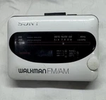 Sony Walkman WM-F68 Portable Cassette Player In White.. Fixed Price $75.00.