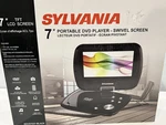 Sylvania SDVD7040B Lcd Portable Player MP3 W/ Remote New In Box. Fixed Price $89.95.