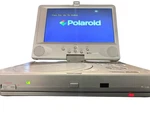 Polaroid Dvd Player PDV-0700 Silver Portable With Remote No Charger. Fixed Price $35.00.