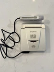 Sony Portable Minidisc Player Walkman MZ-E33 & Remote Tested Working W/3 Disks. Fixed Price $119.99.