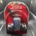 Tozai ATC-1143 Am/fm Radio Player W/ Headphones Sealed Silver. Fixed Price $17.70.
